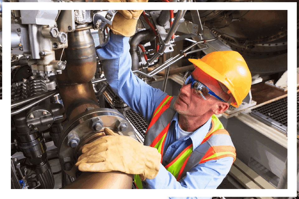 Engineer repairing industrial machinery.